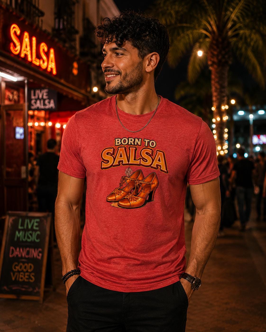 Red tri-blend unisex t-shirt with Born to Salsa graphic featuring illustrated orange and gold Latin dance shoes design by Baila Boutique